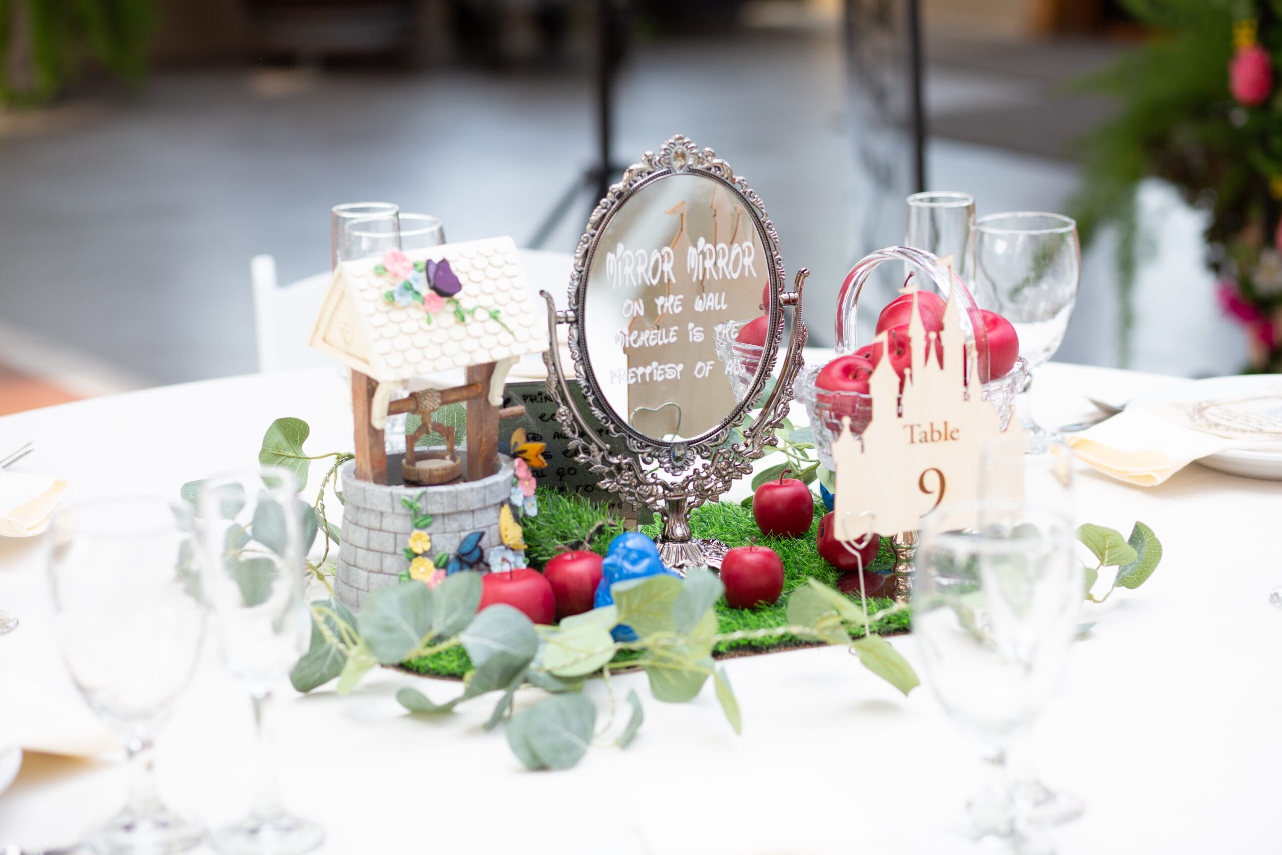 Michelle (Minka) Collins and Richard DeAngelo incorporated beautiful Disney centerpieces into their wedding reception. Photo: