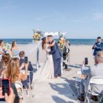 Colorful Florals And a Beautiful Beach Ceremony at This Shore Wedding