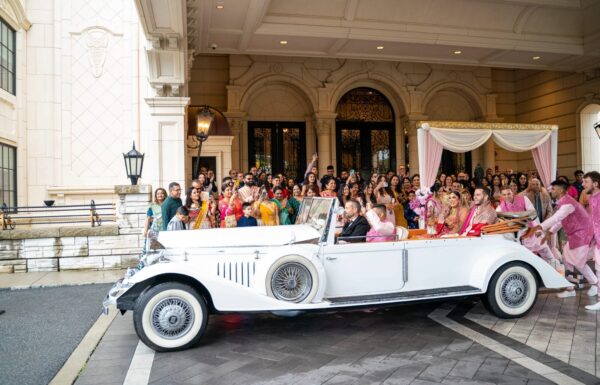 The wedding of A Lavish Hindu Wedding with Vibrant Florals & Acrobatic Performers Gallery 13