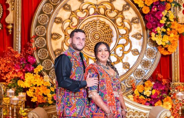 The wedding of A Lavish Hindu Wedding with Vibrant Florals & Acrobatic Performers Gallery 6