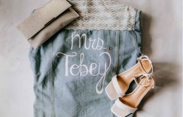 The wedding of A Waterfront Wedding Featuring The Couple’s Dog & Pride Flags at the Ceremony Gallery 12