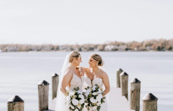 The wedding of A Waterfront Wedding Featuring The Couple’s Dog & Pride Flags at the Ceremony Gallery 8