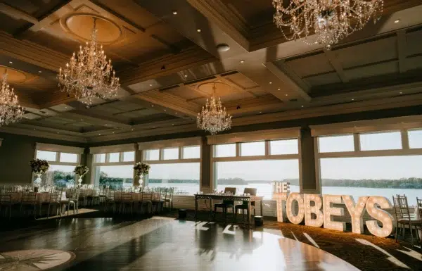 The wedding of A Waterfront Wedding Featuring The Couple’s Dog & Pride Flags at the Ceremony Gallery 4