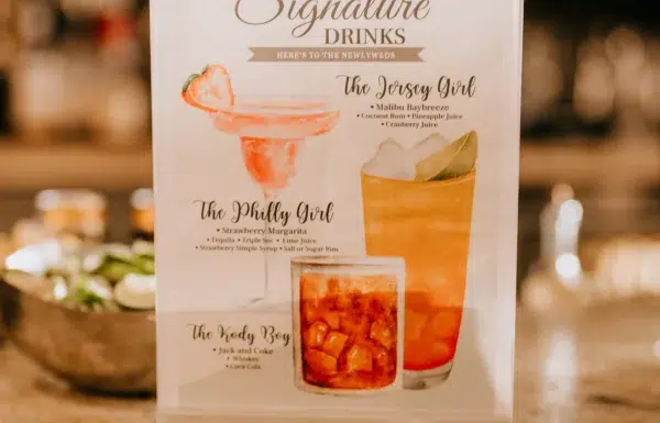 The wedding of A Waterfront Wedding Featuring The Couple’s Dog & Pride Flags at the Ceremony Gallery 3