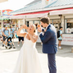 This Couple Ate Pizza on the Boardwalk In Their Wedding Outfits