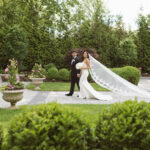 A Concert Stage Proposal, All-White Florals, and Breakfast Sandwiches on the Dance Floor at the Estate at Florentine Gardens