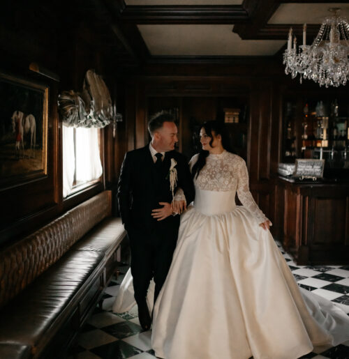 The wedding of Traditional Irish Performers, a Guinness Station & Dramatic Candlelight at Park Savoy Ballroom wedding at the Park Savoy Estate at Florham Park NJ with tons of Irish details like a green cake, Guinness station and Irish step dancers.