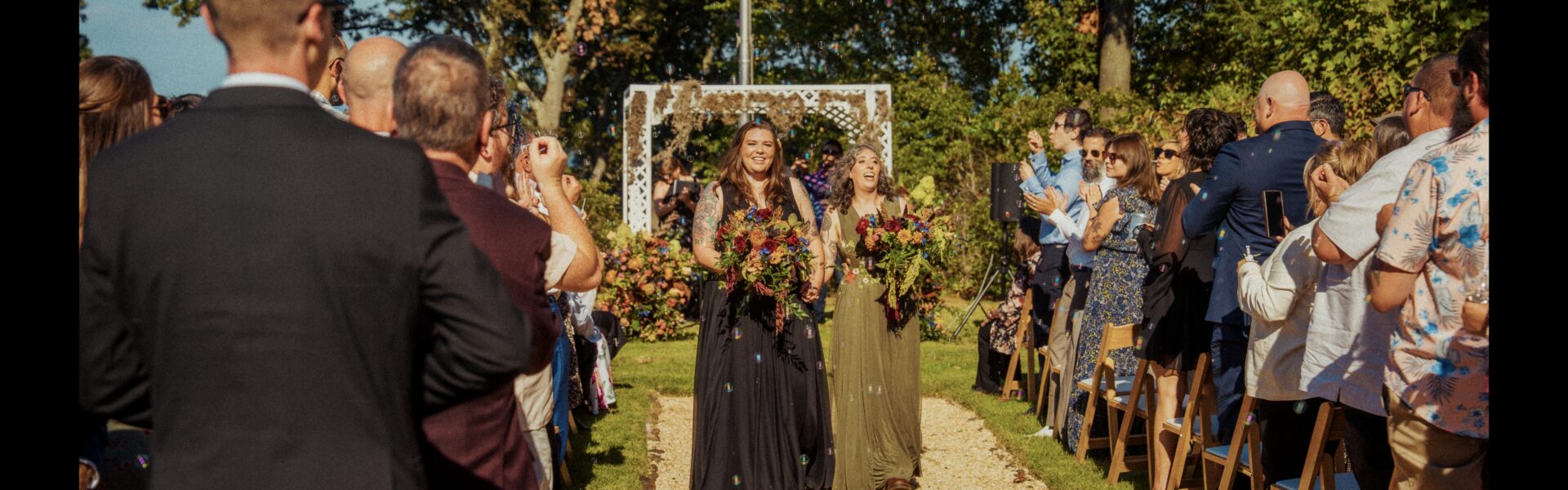One Wore Black, One Wore Green, and Their Florist’s Brief Was “Weird and Witchy” at The Water Witch Club