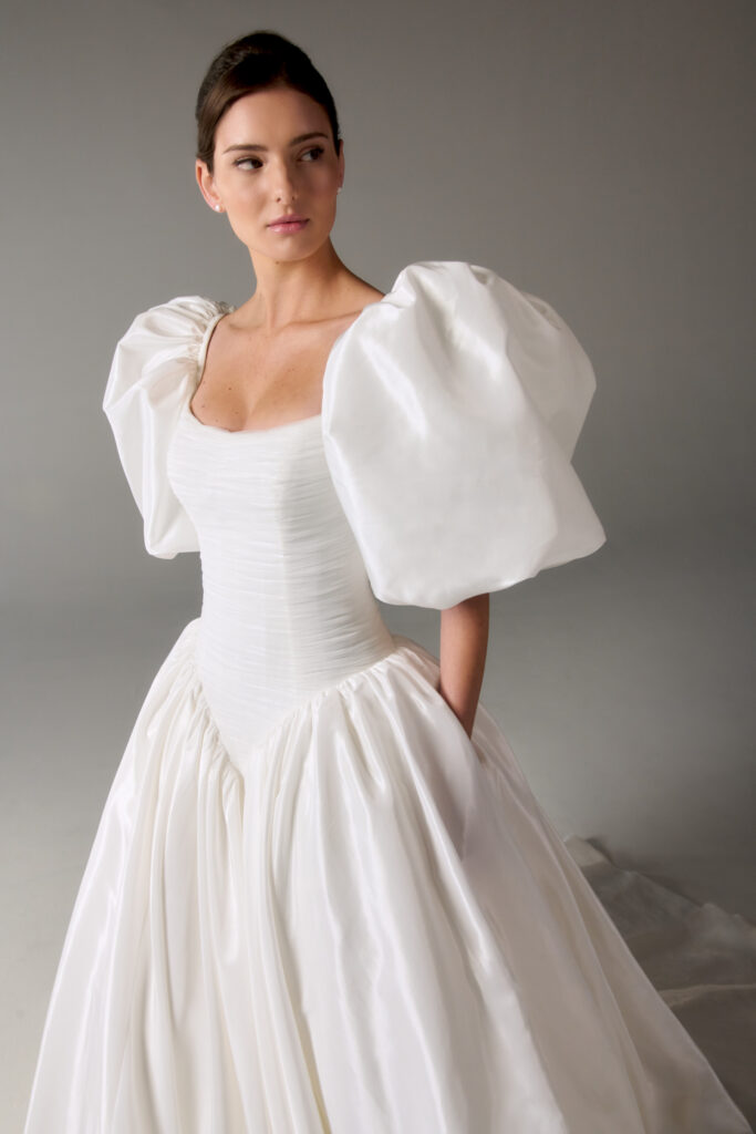 Justin Alexander Spring 2027 gowns during New York Bridal Fashion Week.