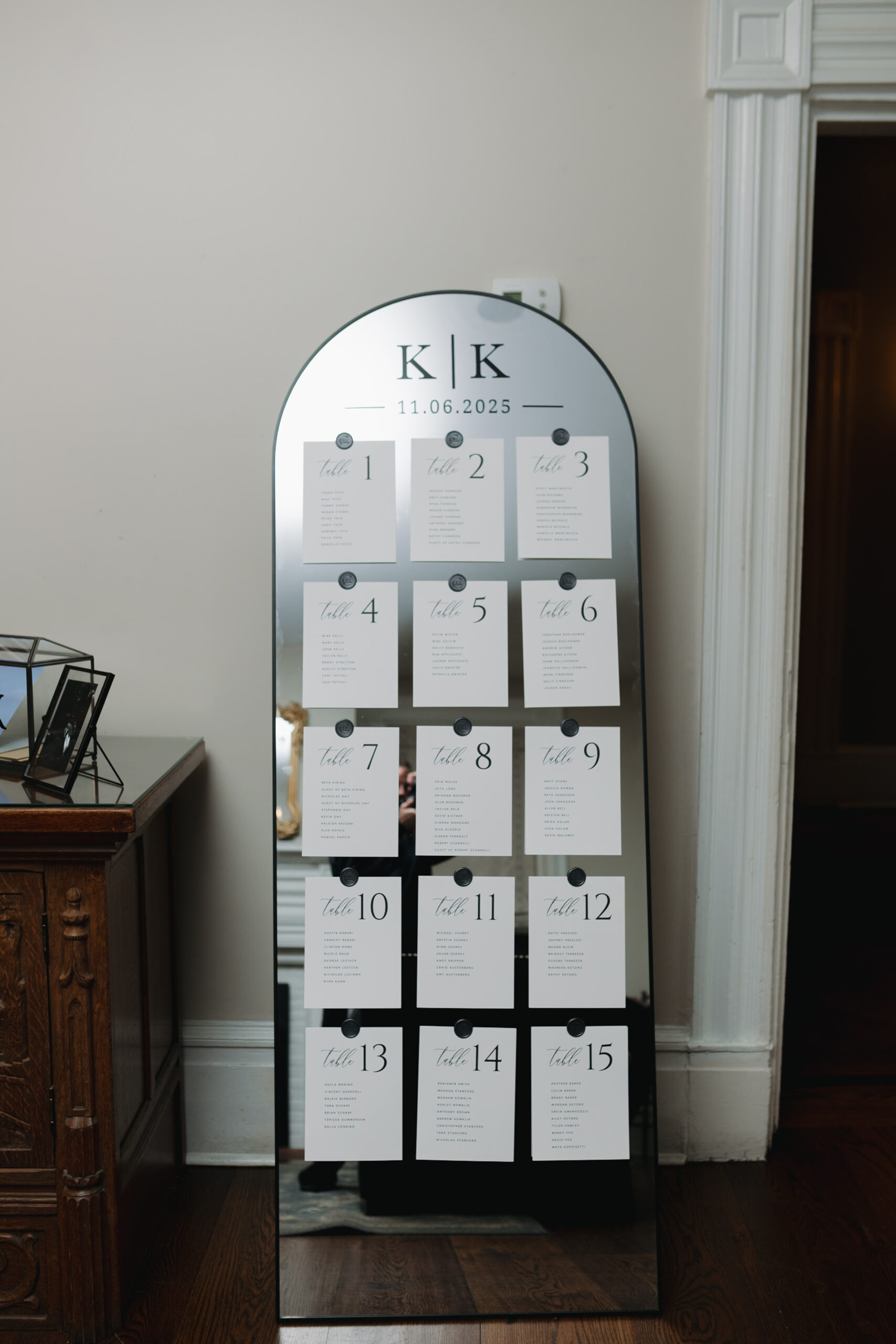Handmade bar signage and seating chart at a budget-friendly NJ wedding