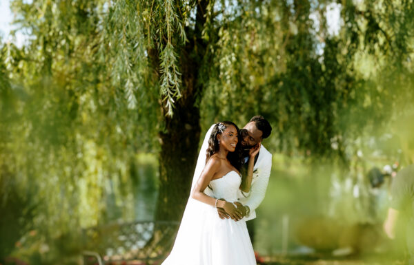A Nigerian Money Spray, Haitian Blessings & White Roses That Mirrored Their Parents’ Wedding Flowers
