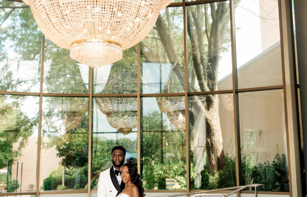 A Nigerian Money Spray, Haitian Blessings & White Roses That Mirrored Their Parents’ Wedding Flowers
