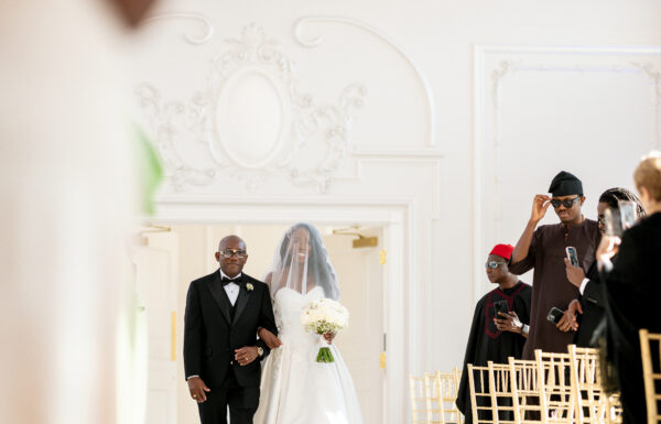 A Nigerian Money Spray, Haitian Blessings & White Roses That Mirrored Their Parents’ Wedding Flowers