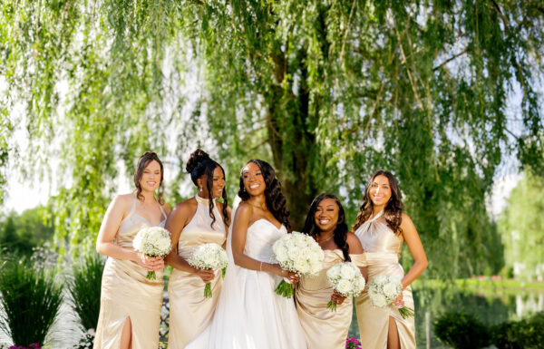 A Nigerian Money Spray, Haitian Blessings & White Roses That Mirrored Their Parents’ Wedding Flowers