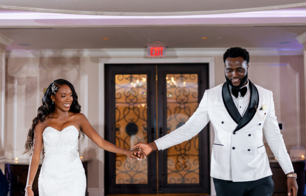 A Nigerian Money Spray, Haitian Blessings & White Roses That Mirrored Their Parents’ Wedding Flowers