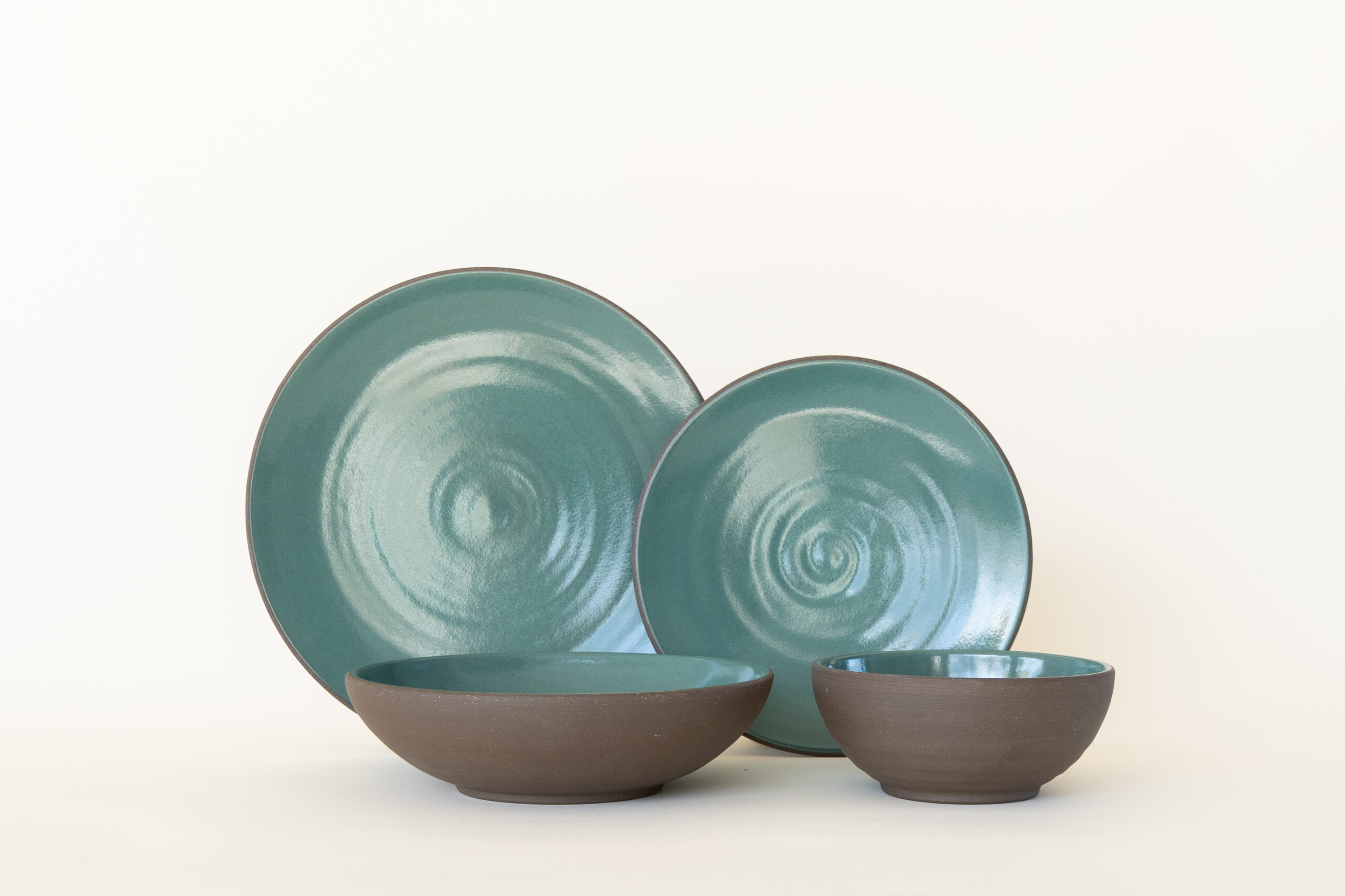 Handcrafted Jono Pandolfi Coupe dishes, a unique and stylish wedding registry pick