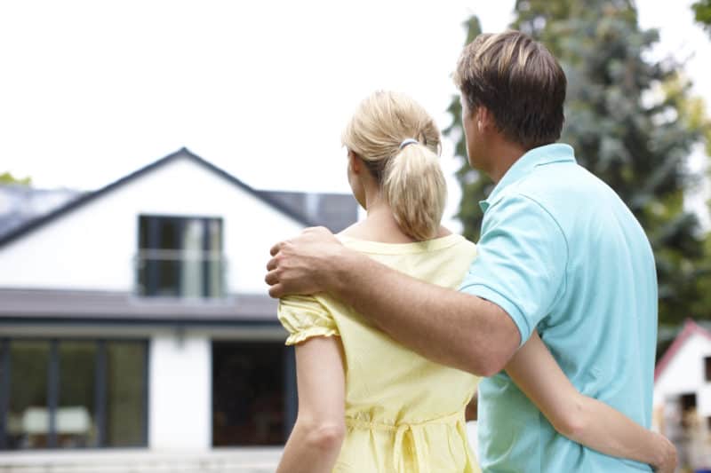 New Jersey Bride‚young-couple-looking-at-house-buying-a-home