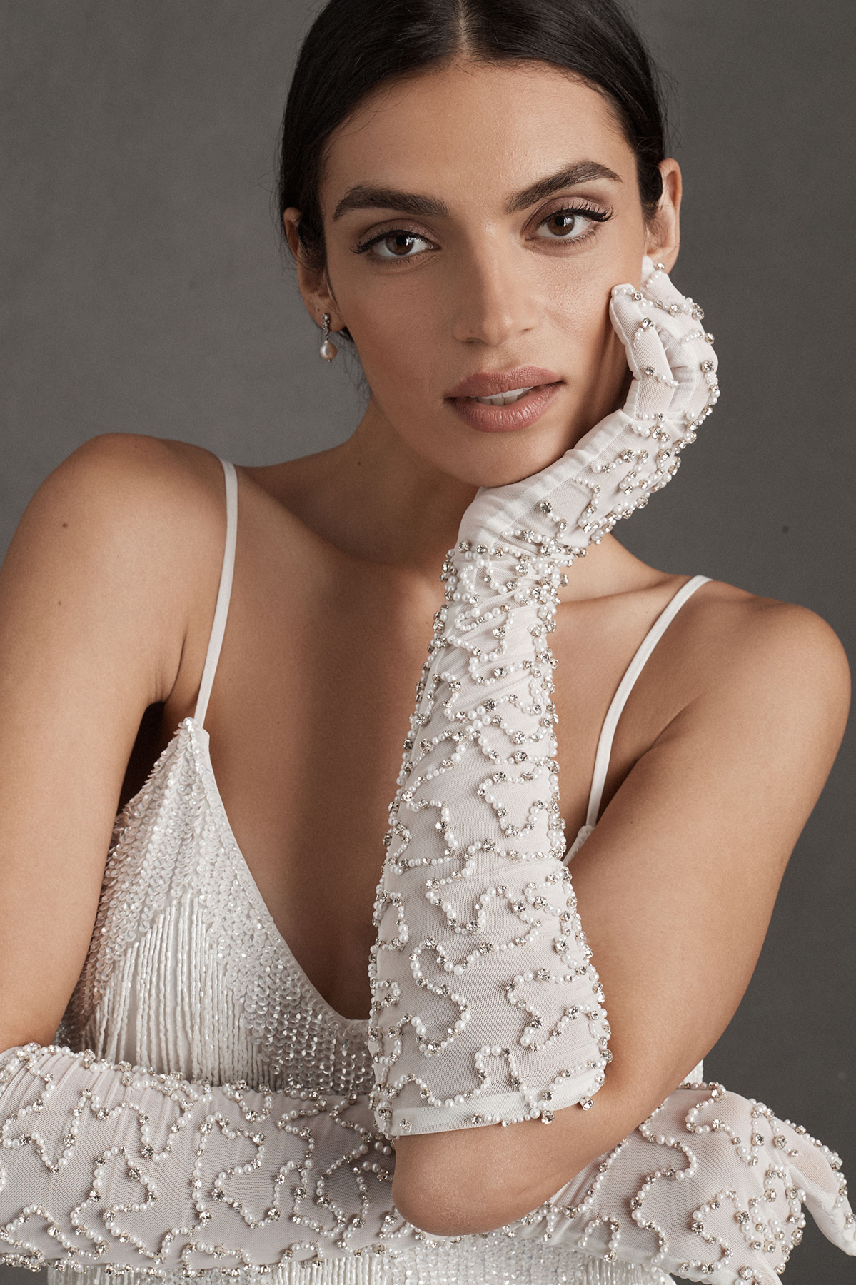 These embellished gloves are a unique accessory for the bride.