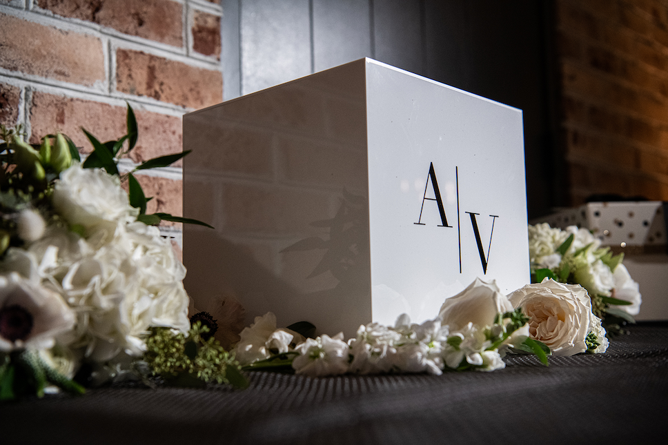 A black and white minimalist card box at the couple's Perona Farms wedding.