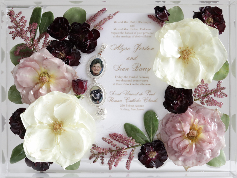 Treasured Gifts offers floral preservation in New Jersey. This is a resin keepsake including flowers and a wedding invitation.