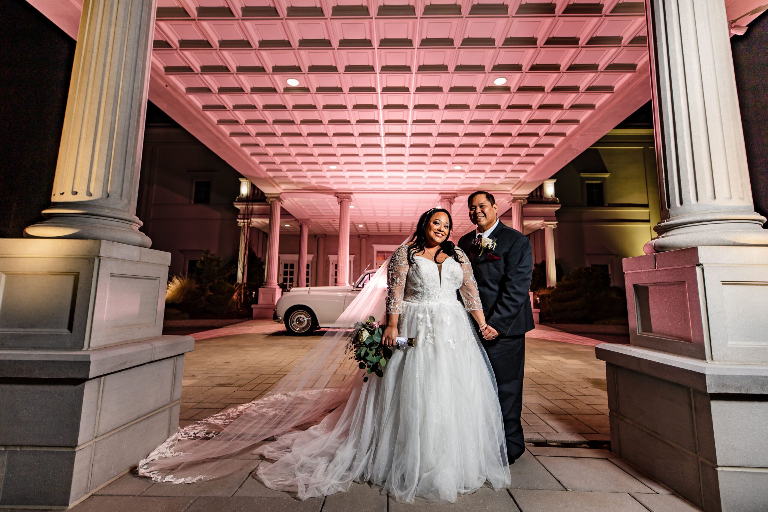 The couple poses outside at their Palace at Somerset Park wedding.