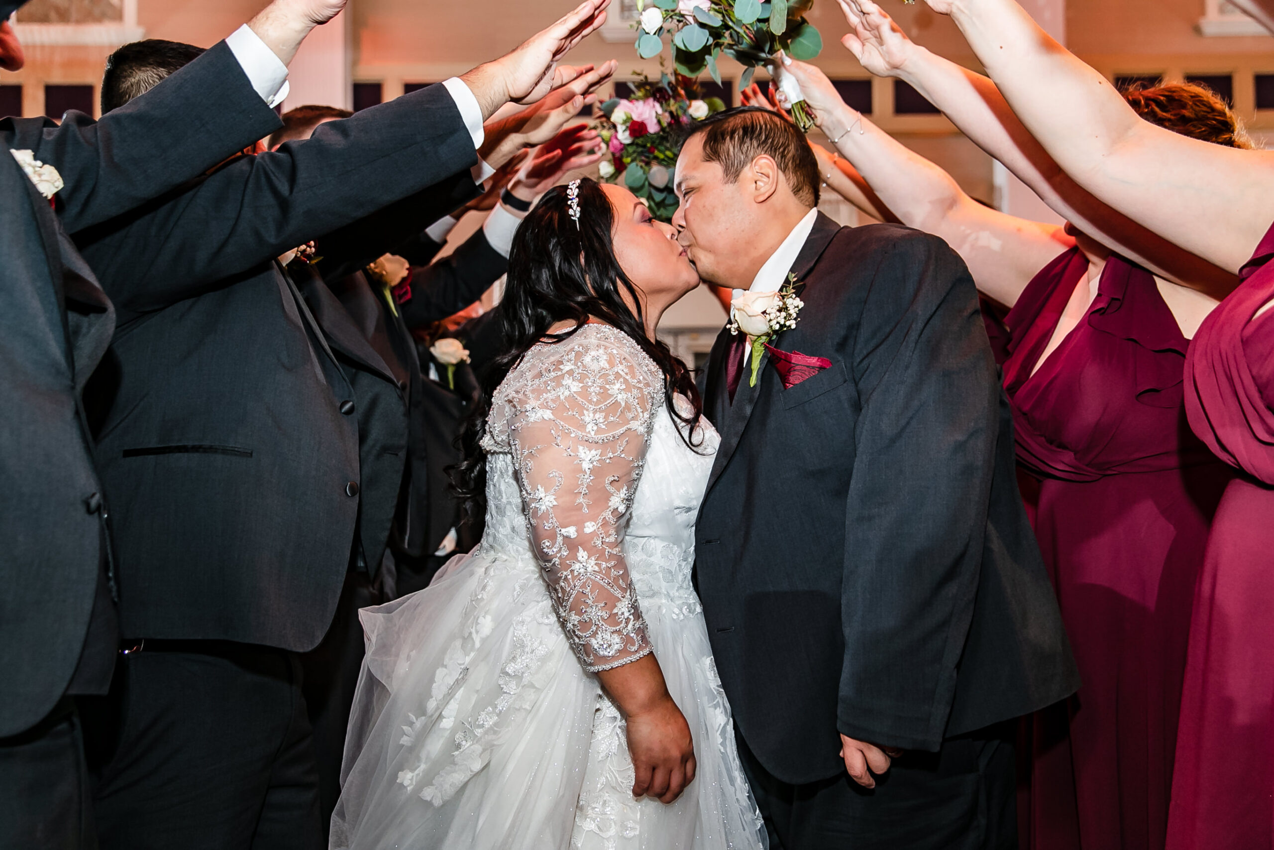 The couple kisses at their Palace at Somerset Park wedding.