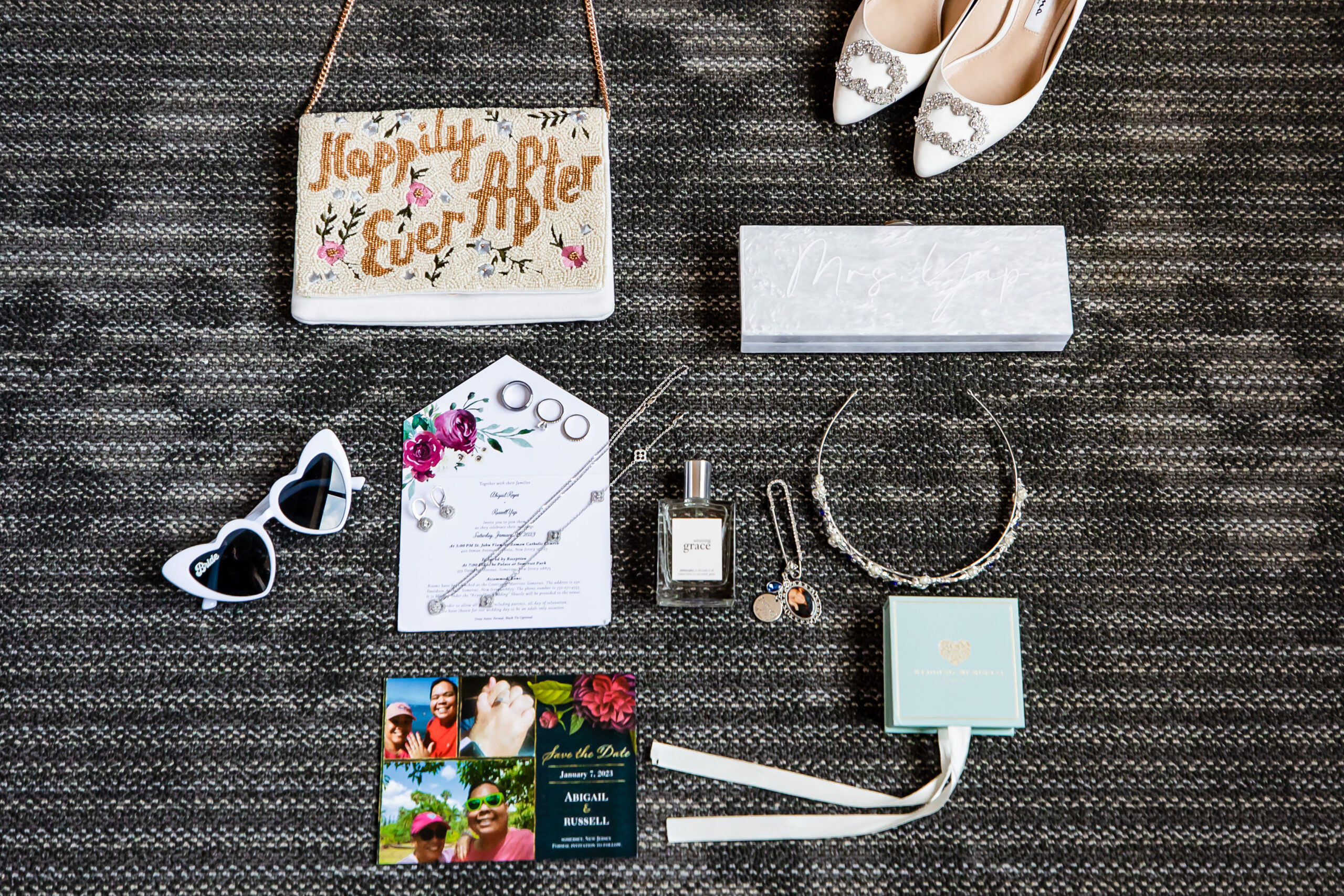 Details including the bride's accessories and stationary for the couple's Palace at Somerset Park wedding.