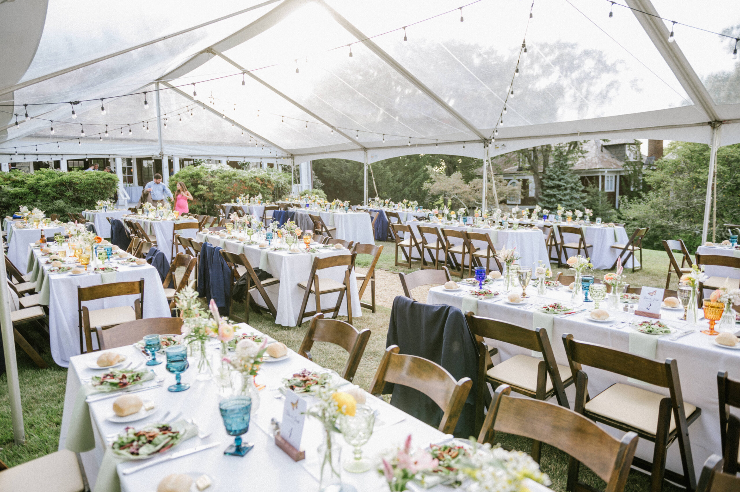 A tented wedding at the Water Witch Club.