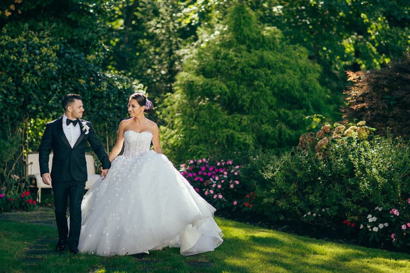 Bride and groom outside The Crystal Plaza Livingston, New Jersey