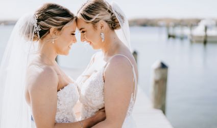 A Waterfront Wedding Featuring The Couple’s Dog & Pride Flags at the Ceremony
