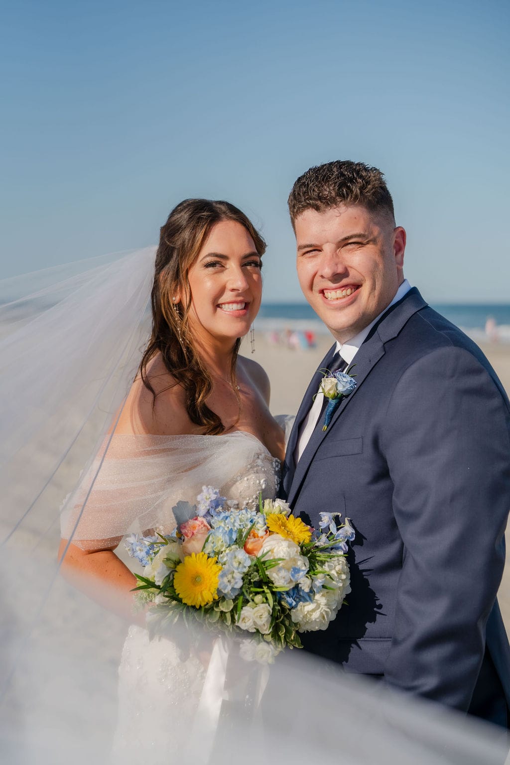 An ICONA Windrift wedding on the beach at the Shore in New Jersey.