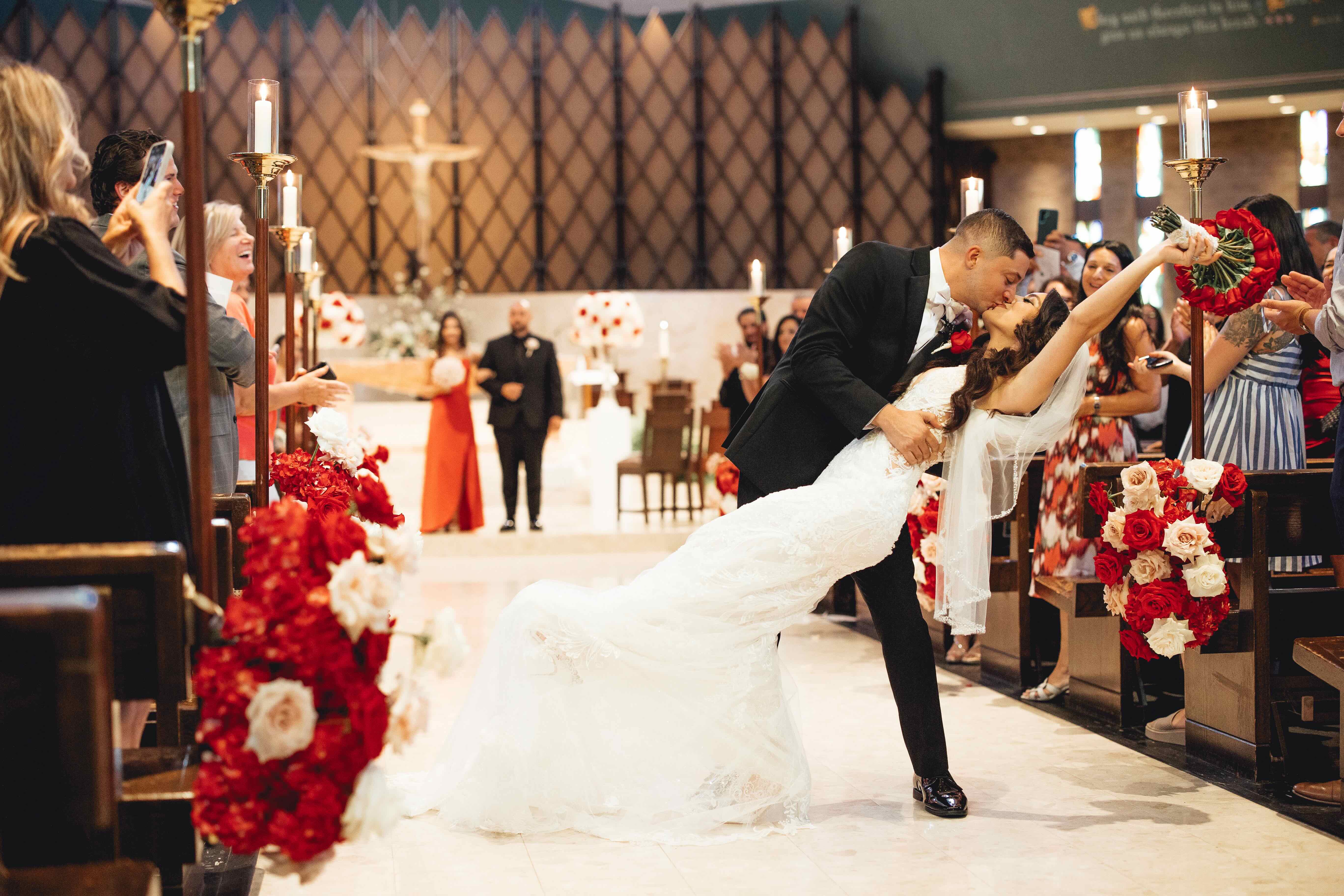 A stunning wedding at the Venetian in New Jersey with a red color scheme.