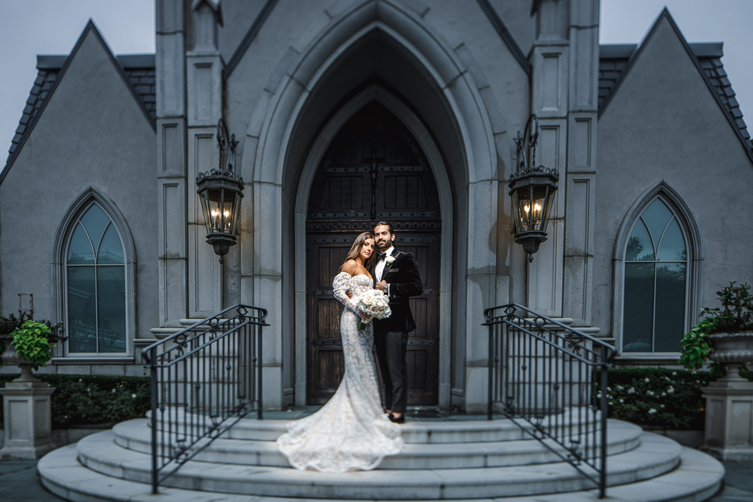 Bride and groom outside the chapel at Park Chateau.