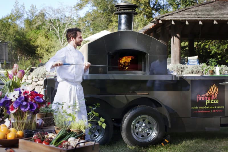 Pizza ovens at glamping wedding tent wedding