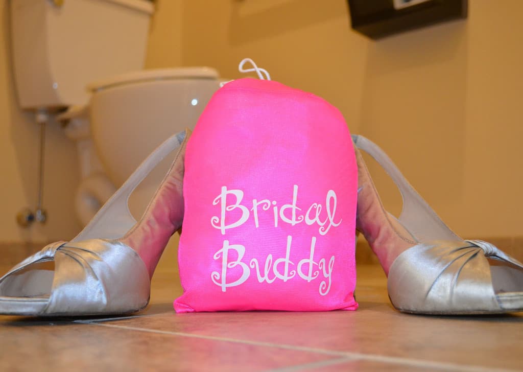 The Bridal Buddy allows brides to use the toilet without