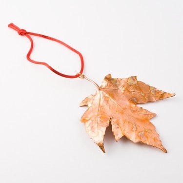 Maple leaf ornament for fall wedding favor.